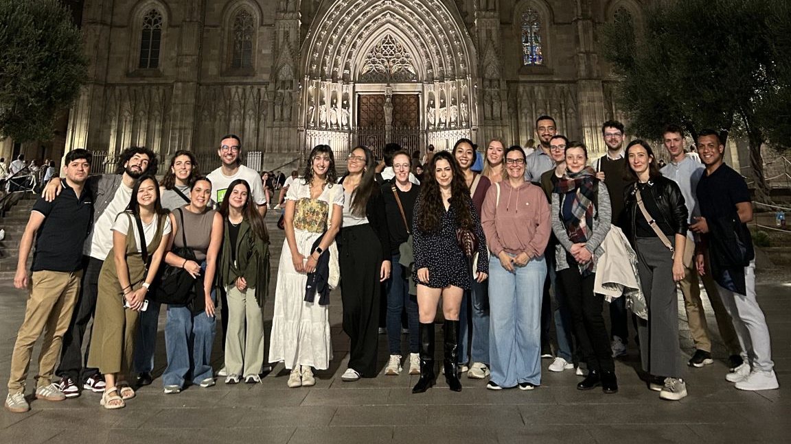 Participants in front of Barcelona Cathedral in the evening